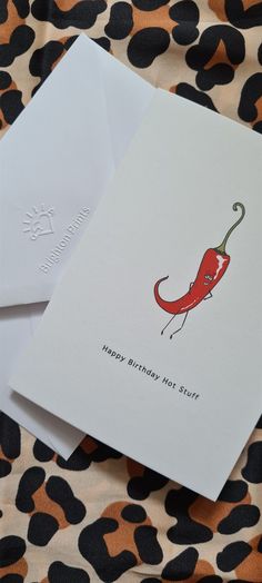 two greeting cards with an image of a hot pepper on one and a happy birthday note on the other