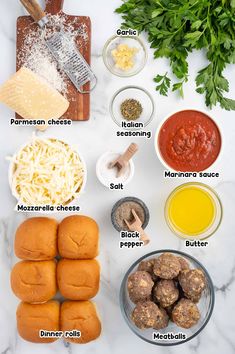 the ingredients to make italian meatballs laid out on a counter