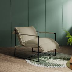 a chair sitting on top of a wooden floor next to a plant in a room