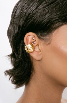 Stack on the shine with this bold ear cuff plated in polished silver or glossy 18-karat yellow gold. Sold as a single earring 5/8"W x 5/8"L 18k-gold plate or rhodium plate Imported Ear Cuff Ideas, Gold Ear Cuff, Back Necklace, Ear Stack, Shirts For Leggings, Shoes For Leggings, Ear Cuffs, Chain Anklet, Single Earring