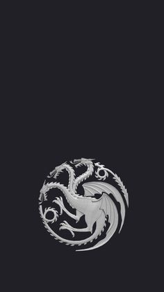 a white dragon on a black background with the words game of thrones written below it