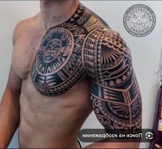 a man with a large tattoo on his chest