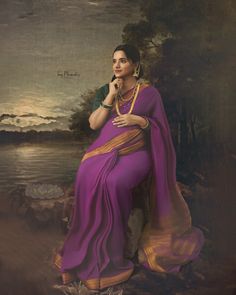 a painting of a woman in a purple sari sitting on a rock next to a body of water