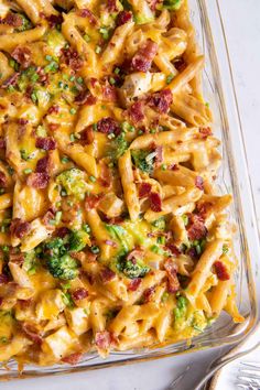 a casserole dish with chicken, broccoli and cheese