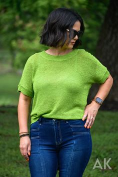 We are loving this bright grass green, short sleeve sweater. It has a soft knit feel with cute ribbed bands on the sleeves, neckline and hem. This fun, bold top is perfect for transitioning from summer to fall! Jessica is wearing a MD. View Model Stats HERE. Knit Roomy Fit 72% Acrylic 28% Nylon Fine Knit Stretch T-shirt For Spring, Trendy Green Ribbed T-shirt, Casual Pointelle Knit T-shirt For Spring, Casual Pointelle Knit T-shirt For Summer, Green Textured Knit Casual Sweater, Casual Green Textured Knit Sweater, Green Soft Knit Casual Sweater, Casual Green Soft Knit Sweater, Short Sleeve Pointelle Knit Top For Day Out