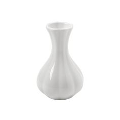 a white vase sitting on top of a table