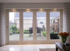 an open living room with sliding glass doors