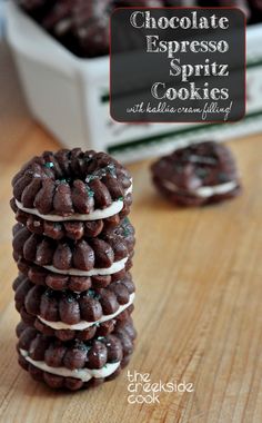 chocolate espresso spritz cookies stacked on top of each other