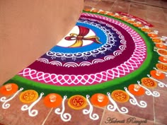 a colorfully decorated floor with an intricate design on it