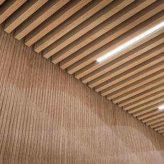 the ceiling is made out of wooden slats