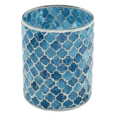 a blue and white glass candle holder