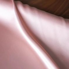 Description:This Blush Pink Silk Satin fabric offers a soft, lustrous finish with a gentle sheen, perfect for creating dreamy bridal gowns, evening dresses, and elegant accessories. The delicate blush pink hue brings a romantic and feminine touch, ideal for modern and classic designs. Its smooth drape ensures a fluid movement, adding a touch of luxury to every garment. Material Composition: 100% SilkWidth: 44.9 inches (114 cm)Care Instructions: Dry clean only. Avoid prolonged exposure to direct sunlight to maintain the vibrant color.Suggested Uses: Ideal for bridal dresses, evening gowns, lingerie, and flowy scarves. Its gentle drape and subtle shine also make it suitable for luxurious home decor accents like cushions and drapes. Conclusion: This Blush Pink Silk Satin fabric embodies roman Fluid Movement, Silk Satin Fabric, Dress Order, Decor Accents, Dresses Evening, Elegant Accessories, Pink Silk, Custom Tailoring, Dress Size Chart