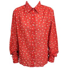 Celine forever celebrates the Bon Chic Bon Genre style of classical Parisian girl prettiness. Classic semisheer cotton batiste "mens" shirt strewn with colorful bumble bees and pin wheels by Celine, Paris on a tomato red ground. Classic styling with button front 1970s France. Mother of pearl Celine buttons. Excellent condition. Size 46 Vintage. Celine Paris, Phoebe Philo, Logo Shirt, Jet Set, Printed Cotton, Shirt Blouses, Mens Shirts, Fashion Outfits, Celebrities