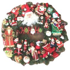 a christmas wreath with santa claus and other ornaments