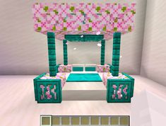 a bed made out of lego blocks in a room with pink and green decor on the walls