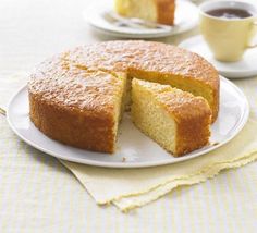 a cake on a plate with one slice cut out