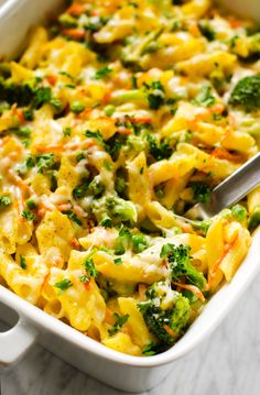 a casserole dish with broccoli and cheese