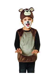 a young boy wearing a bear costume and holding his hands out to the side while standing in front of a white background