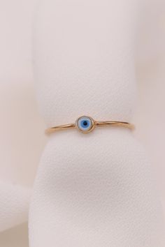 "Gold Evil Eye / Handmade Evil Eye Ring / 14k & 18k Evil Eye Ring Available in Gold, Rose and White Gold ❥ ITEM DETAILS ---> Gold Color of Choice : Yellow Gold, Rose Gold, White Gold ---> Material : 14k ( 585 ) or 18k ( 750 ) Real Gold. It is Not Gold Filled or Gold Plated ---> Made to order ---> Band Thickness : 1.05 mm ---> Band Width : 1.05 mm ---> Evil Eye Made of Enamel ---> Ship in 4 - 7 Business Days ❥ Gift Wrapping and Packaging All items are packed in the high-q Evil Eye Jewelry Bracelet, Evil Eye Ring Silver, Gold Thumb Rings, Nose Ring Jewelry, Evil Eye Art, Handmade Evil Eye, Gold Bangles For Women, Pearl Necklace Wedding, Music Jewelry