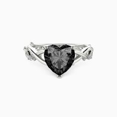 a black and white diamond ring on a white background