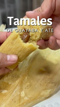 a person is holding food in their hand with the caption tamales de guyaba ate