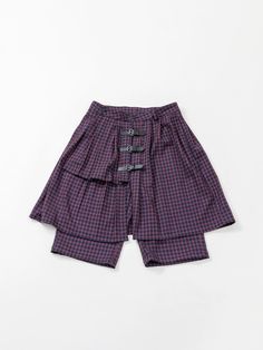 Embrace a blend of vintage charm and modern style with our Double-Layer Design Skirt Pants. Featuring a retro plaid pattern and a unique double-layer design, these skirt pants are perfect for making a bold fashion statement. The punk-style leather buckle can be fastened or left open for versatile styling. With a loose fit, these skirt pants are suitable for both men and women. Pair them effortlessly with a T-shirt for a chic summer look. Double-Layer Design: Adds depth and dimension to your outfit. Retro Plaid Pattern: Brings a vintage vibe to your wardrobe. Punk-Style Leather Buckle: Can be adjusted for different looks. Unisex Loose Fit: Suitable for both men and women. Easy to Style: Perfectly pairs with a simple T-shirt for a complete summer look. Model Information: Height: 165cm, Weigh Design Skirt, Outfit Retro, Make Your Own Clothes, Simple T Shirt, Layer Design, Punk Style, Vintage Vibe, Hot Outfits, Summer Look