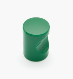 a green cup with a handle on it