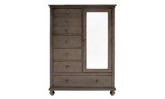 the armoire is made from wood and has drawers with mirrors on each side,