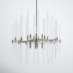 Streamlined forms create an unexpectedly lavish effect in this modern chandelier. Its eight lights are refracted through a nimbus of clear glass rods held at varying heights + lengths by slim steel arms in a polished finish. The smaller size makes a statement without overwhelming your space. AllModern Finish: Polished Nickel AllModern Divine-Mini Chandelier in Polished Nickel | Size 21.75" H X 23.5" W X 23.5" D Traditional Chandelier, Mini Chandelier, Sputnik Chandelier, Stevie Nicks, Royal Wedding, Modern Chandelier, All Modern, Polished Nickel, Modern Lighting