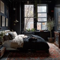 a bedroom with black walls and lots of plants