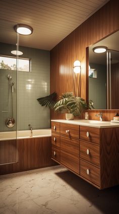 a bathroom with a sink, mirror and bathtub next to a shower stall in the corner