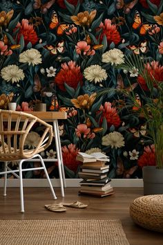 a chair sitting in front of a wallpaper with flowers and butterflies on it's side