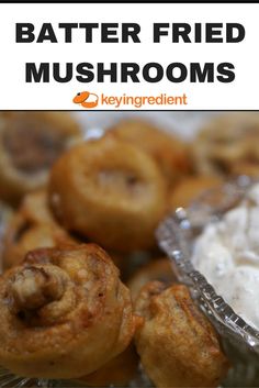 some fried mushrooms are in tin foil with white cream on top and the words, better fried mushrooms