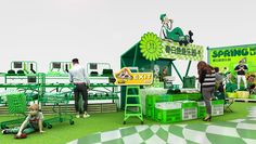 people are standing and sitting in front of an outdoor fairground with green items on display