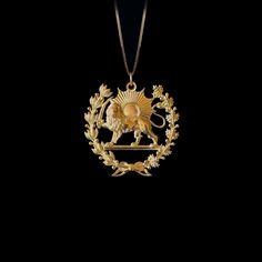 Elevate your style with our 14k Gold Lion Sun Pendant. This solid gold necklace showcases exquisite craftsmanship, symbolizing the strength and vitality of the lion and the sun. The 14 karat gold Lion Sun pendant is more than just jewelry; it's a fine representation of symbolism and beauty, also available in 18k yellow gold. PENDANT INFORMATIONThis pendant is made of real, solid gold.• Made in USA• Material: 14k or 18k solid gold• Finish: polished• Height: 1.15" (29 cm) | *includes the small cir Lion Accessories, Lion Pendant Gold, Small Gold Pendant, Sun Pendant Gold, Lion And Sun, Lion Queen, Persian Jewelry, Gold Coin Jewelry, Lion Jewelry