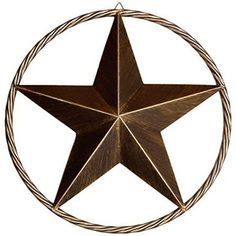 a metal star hanging on a wall