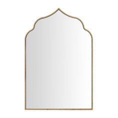 an ornate mirror with gold trimmings on the edges and a white back ground