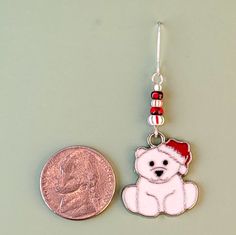 Nothing says Christmas like holiday polar bears earrings. These enameled polar bears are far more adorable (and considerably lighter) than their wild counterparts. They feature red enameled hats and peppermint-striped glass accent beads. These are the perfect wearable accessory for your holiday family dinner, These handmade earrings are hypoallergenic. The ear wires are hypoallergenic surgical steel, making them great for sensitive ears. Info: Holiday polar bear earrings Earring length: 2 1/8 in Polar Express Earrings, Polar Bear Bead Pattern, Bear Earing, Penguin Earrings, Snowmen Earrings, Polar Bear Earrings, Sensitive Ears, Family Holiday, Red Glass