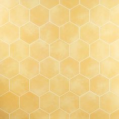 an abstract yellow background with hexagonal tiles