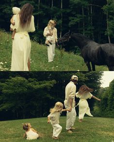 the family is walking in the grass with their horse and two other people are watching them