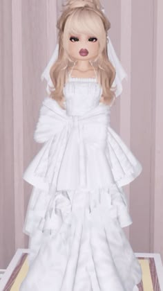 a doll wearing a white dress and veil