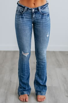 Details: Melanie KanCan Jeans Low Rise Intentional Distressing Fading/Whiskering Good Stretch Bootcut Distressed Hems Zip Fly Button Closure Available in Medium Wash Rise: 8" Inseam: 32" Leg Opening: 18" Material: 93% Cotton, 6% Polyester, and 1% Spandex We are recommending true to size for most comfort! Western Closet, Kancan Jeans, Jeans Low Rise, Comfy Sandals, Jeans Low, Stylish Sandals, Stylish Boots, Curvy Jeans, Comfortable Flats