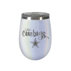 a wine glass with the word cowboys on it and a star in the middle,