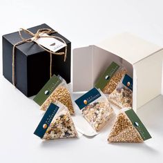 four different types of granola in boxes