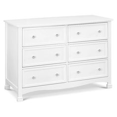 a white dresser with six drawers