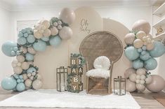 a baby shower is decorated with balloons and decorations