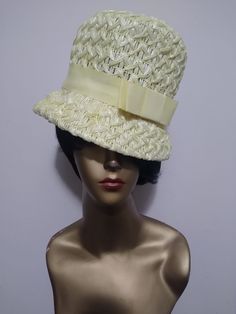 Vintage 1960's Top Hat in Yellow. Woven straw construction with circular opening at crown. Brim is down turned with a wire frame. Beautiful daffodil color with whimsical design. Thick ribbon trim at base with neat bow, also in Yellow. US Union made. Great accessory and conversation piece! Spring Hats With Bow And Curved Brim, Spring Straw Hat With Bow And Short Brim, Formal Straw Hat For Spring, Formal Summer Hat With Bow, Summer Formal Hat With Bow, Formal Spring Straw Hat, Spring Straw Boater Hat With Bow, Formal Spring Cloche Boater Hat, Retro White Sun Hat For Spring