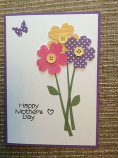 a mother's day card with flowers and butterflies