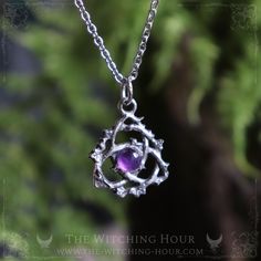 This triquetra pendant surrounded with ivy leaves, is handmade with high quality pewter. It is decorated with a natural amethyst of 6 mm. - Sold without chain or with a stainless steel chain of 46 cm / 17" or 60 cm / 24" (hypoallergenic) - Size of the celtic knot: 2,5 x 2,1 cm This celtic knot pendant is totally handmade with high quality pewter, in our small french studio. The triquetra (celtic knot) is made of fine pewter (97% pure). This high quality pewter does not contain any dangerous subs Triquetra Pendant, Celtic Triquetra, Celtic Knot Pendant, Celtic Trinity Knot, Ivy Leaves, House Items, Trinity Knot, Pagan Jewelry, Knot Necklace