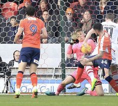 Doncaster Rov 1 Luton Town 1 in Feb 2017 at Keepmoat Stadium. Luton Town keeper Matt Macey makes a fine close quarter save from Tommy Rowe in League 2.